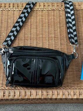 Black Patent bag can be used crossbody or belt